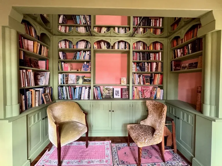 Custom home library alcove shelves and built-in cupboards with distinctive Strawberry Gothic architectural styling