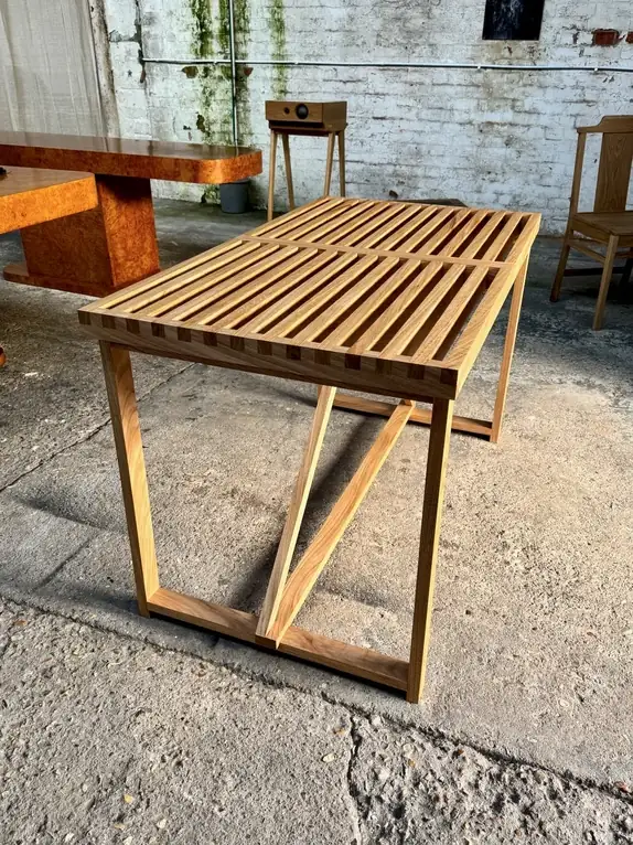 Handcrafted outdoor timber table made from locally sourced sweet chestnut based on the Nelson bench