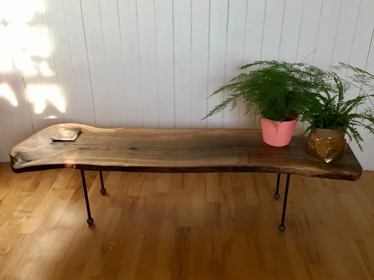 Custom bespoke coffee table handmade out of a uniquely grained live edge field maple timber board